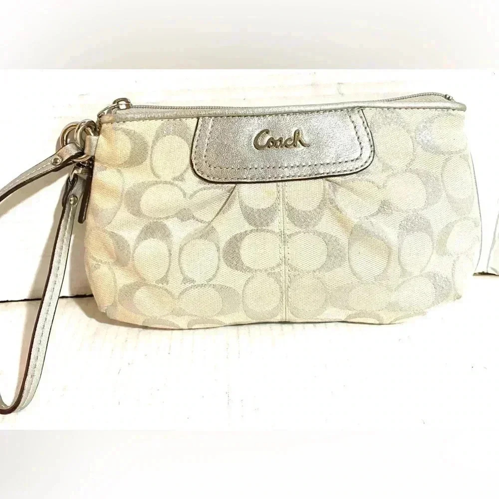 Coach CC signature print canvas wristlet bag